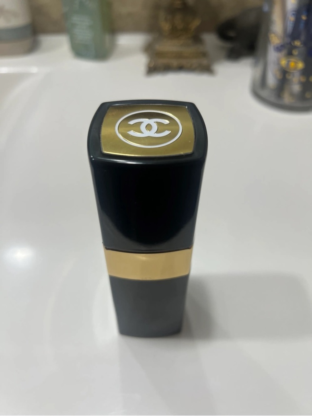 CHANEL Black and Gold Lipstick Case with CC Emblem